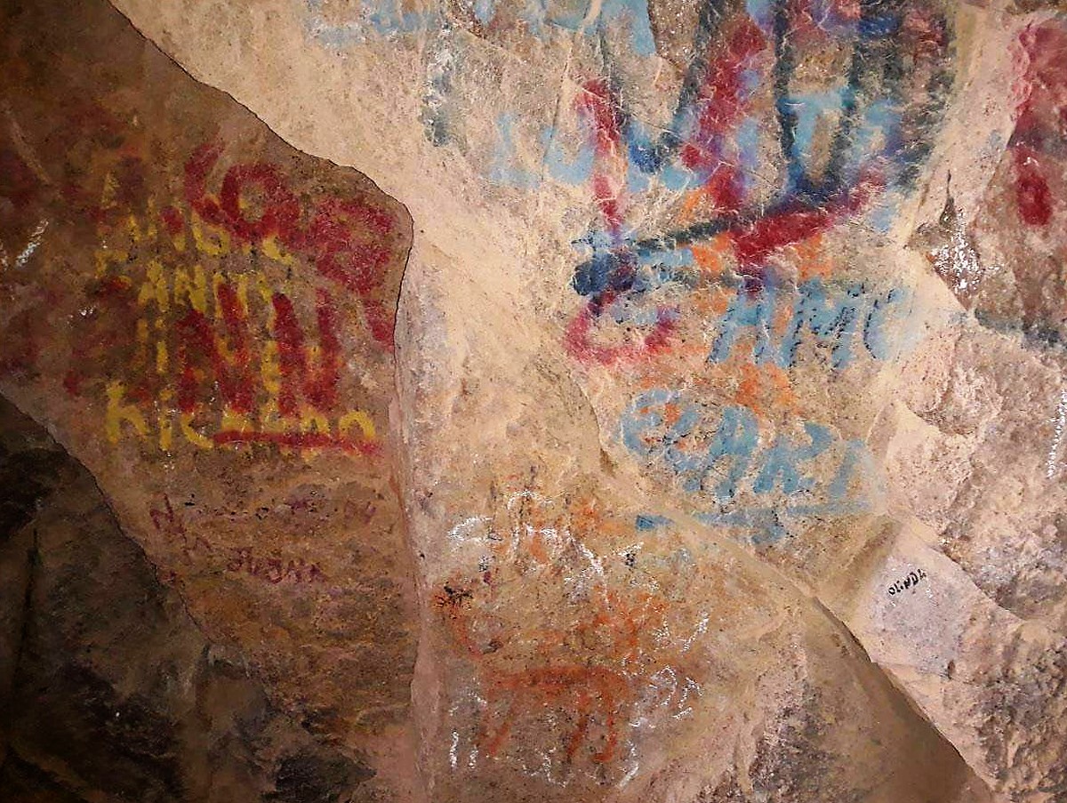vandalism of the rock art in the Anzota Caves in Chile.