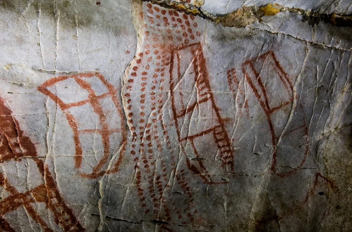 New research suggests that markings on cave walls such as these ones from El Castillo in Spain may have been part of a graphic communication system from the Ice Age, long before writing was invented. Image: Dillon von Petzinger