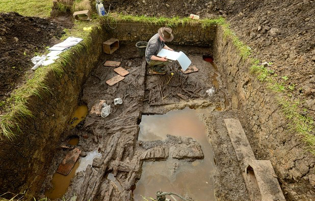 Excavation trenches reveal a minimum of eighteen houses