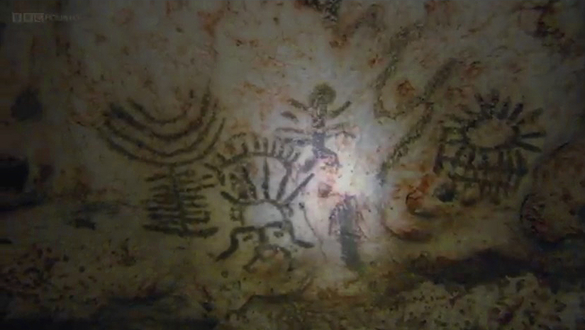 Dr Jago Cooper studies the cave paintings, or pictographs, which researchers believe depicted the Taino origin myth