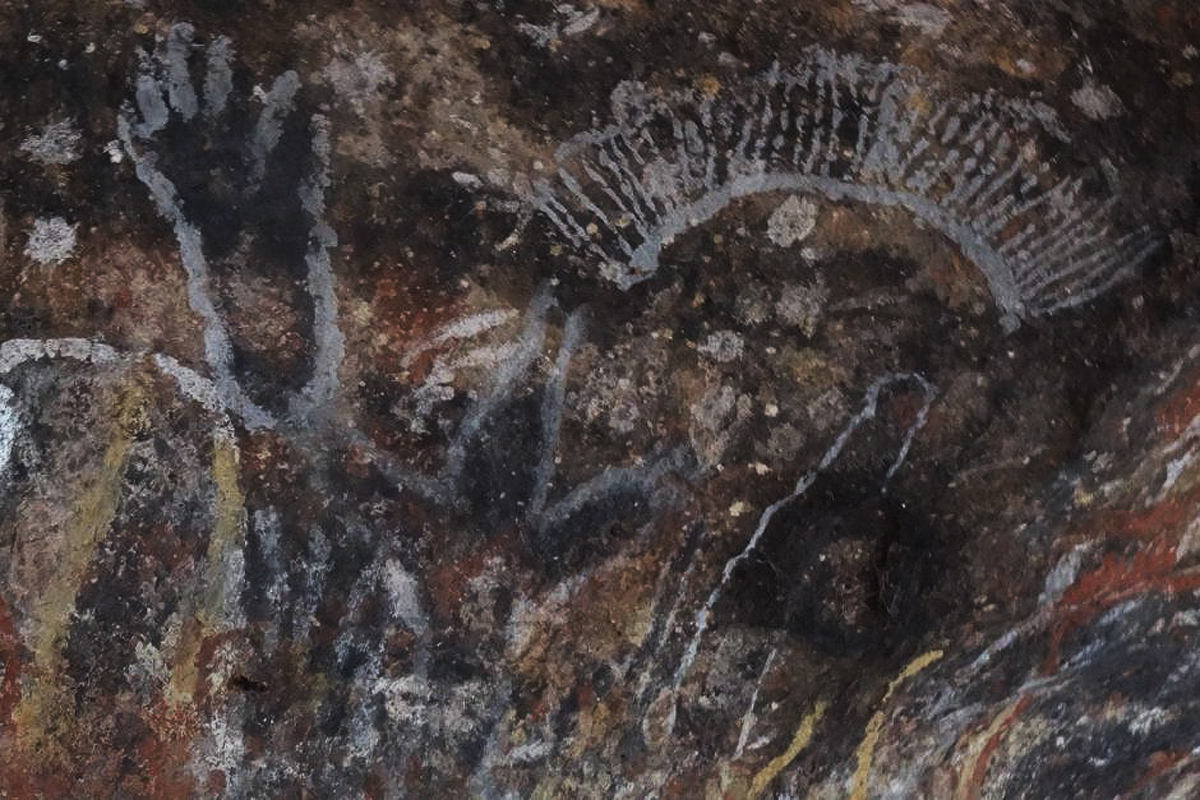 Australia traditional owners aghast Uluru cave painting vandalised vegetable oil national park visitor tourism manager