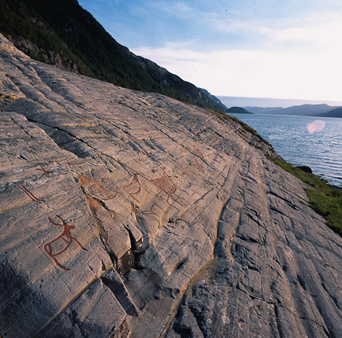 Norway Vingen petroglyphs Aksla quarry rock art carvings quarry shipping port Frøysjøen cultural heritage in Frøysjøen