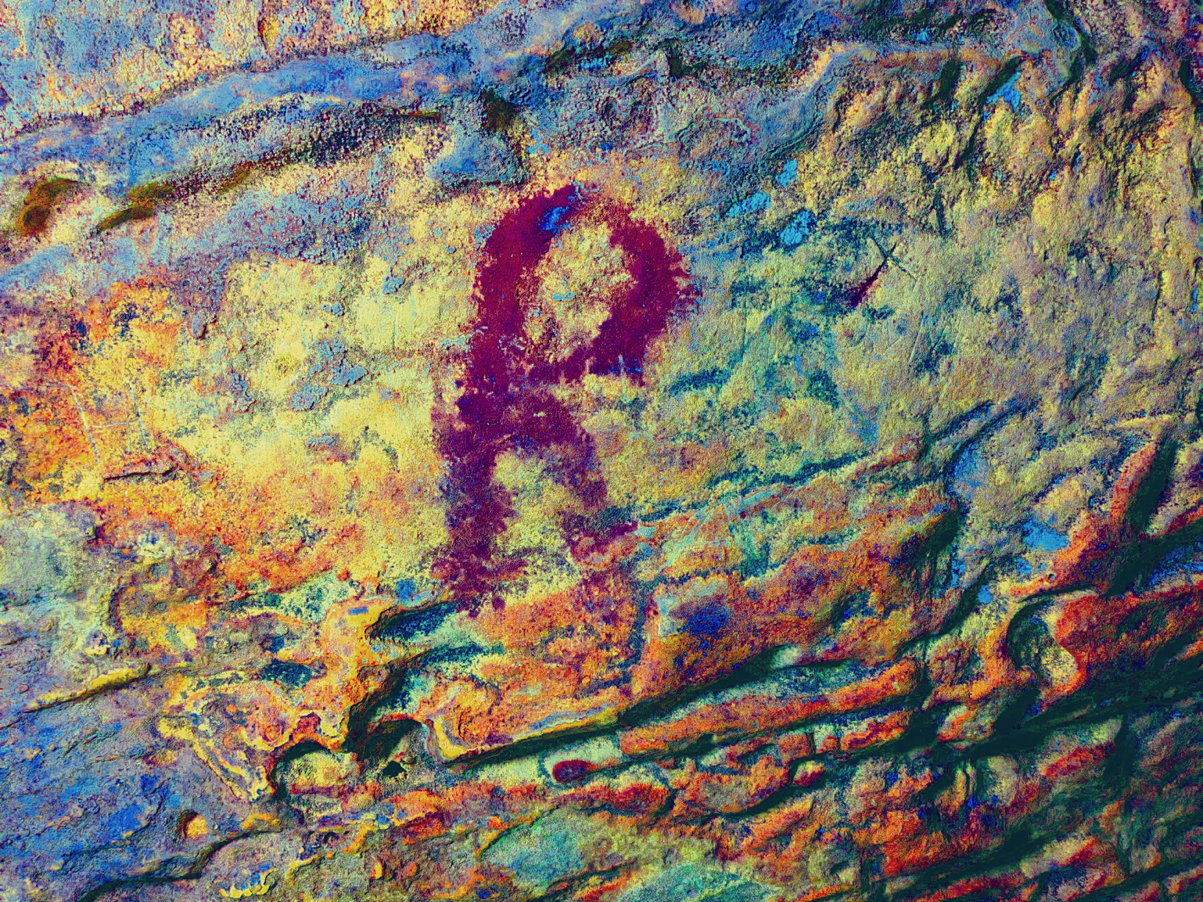 Panel E. D-Stretch image showing two complete circular motifs, along with naturally-secreted haematite