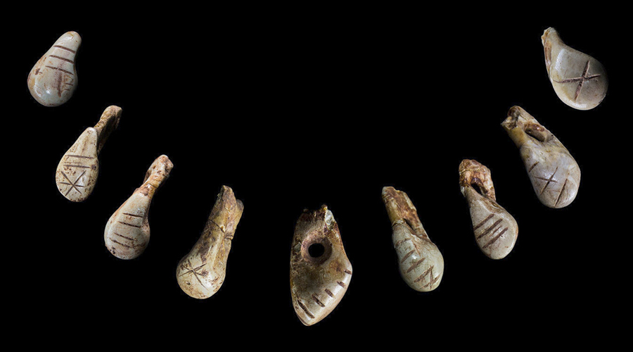 Izzy Wisher, Deer-tooth necklace, Saint-Germain-La-Rivière, Magdalenian, Archaeology, Last Glacial Maximum, Burial, SocietyM red-deer, teeth, France, Bradshaw Foundation