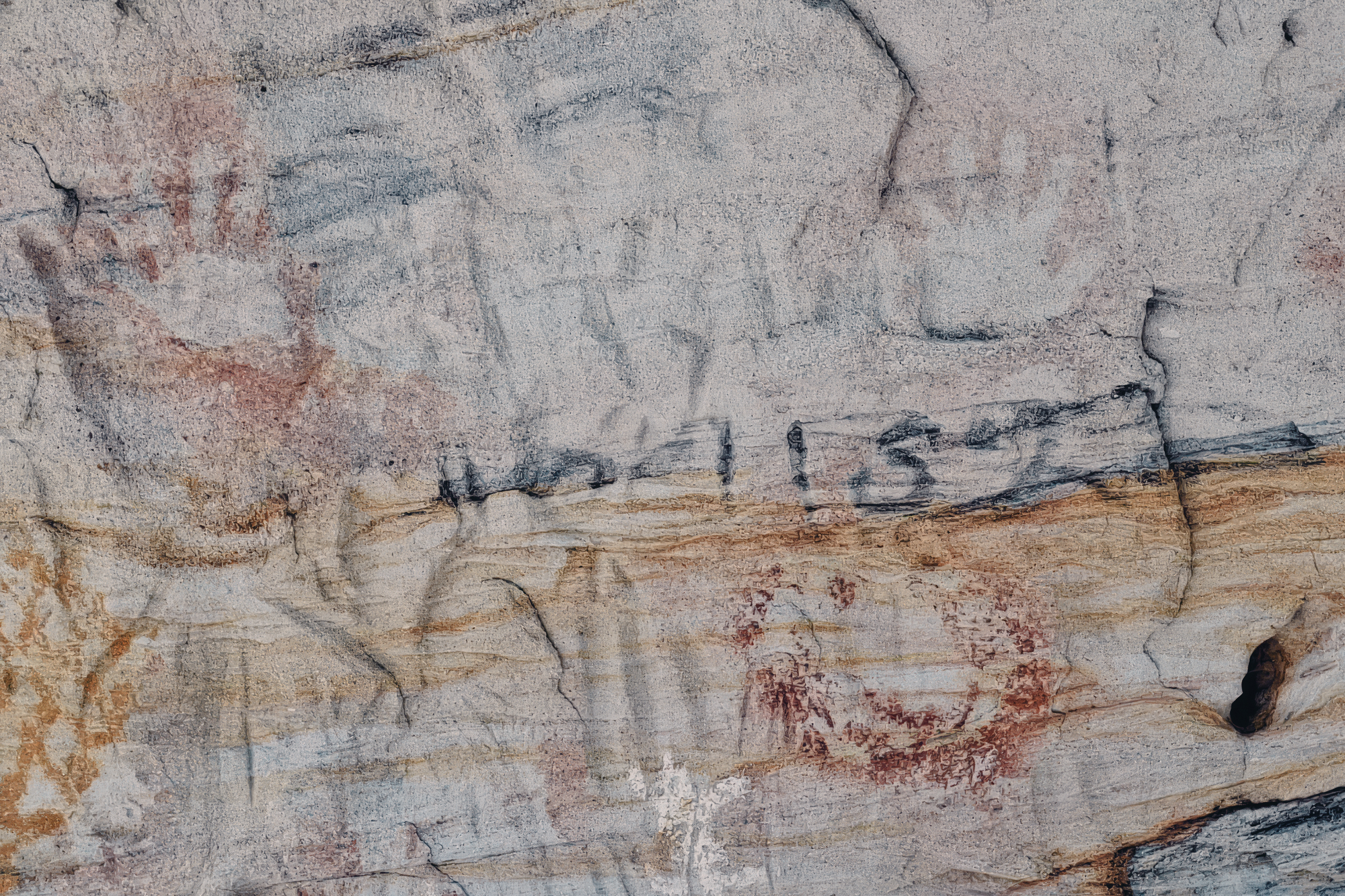 Queensland's environment department is reminding visitors to report vandalism like graffiti or carvings at protected sites