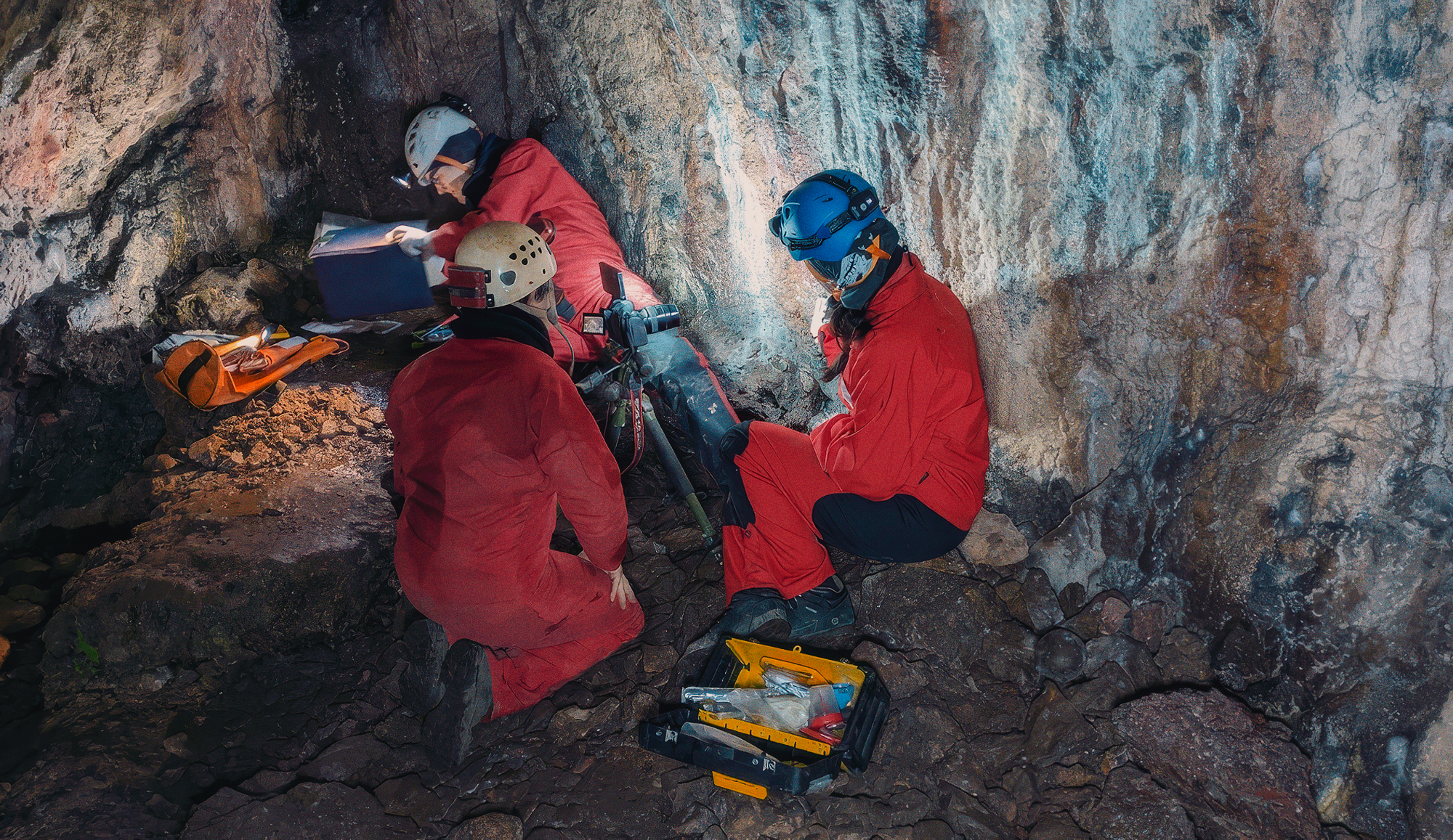 An international team working in Bacon Hole in Gower, Swansea