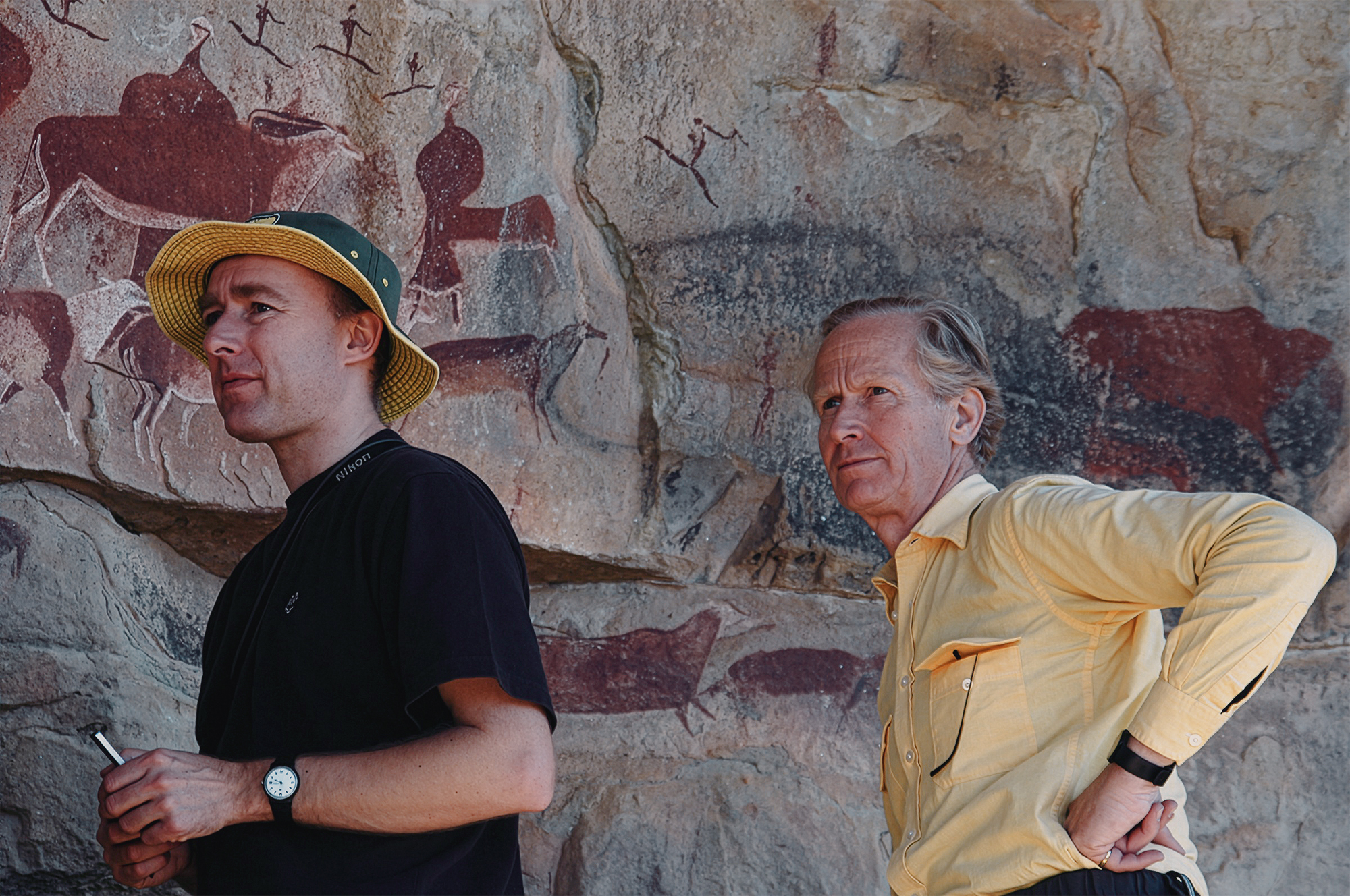 Damon de Laszlo (right) studying the San rock art with Dr Ben Smith at Game Pass Shelter in the Drakensberg Mountains of South Africa