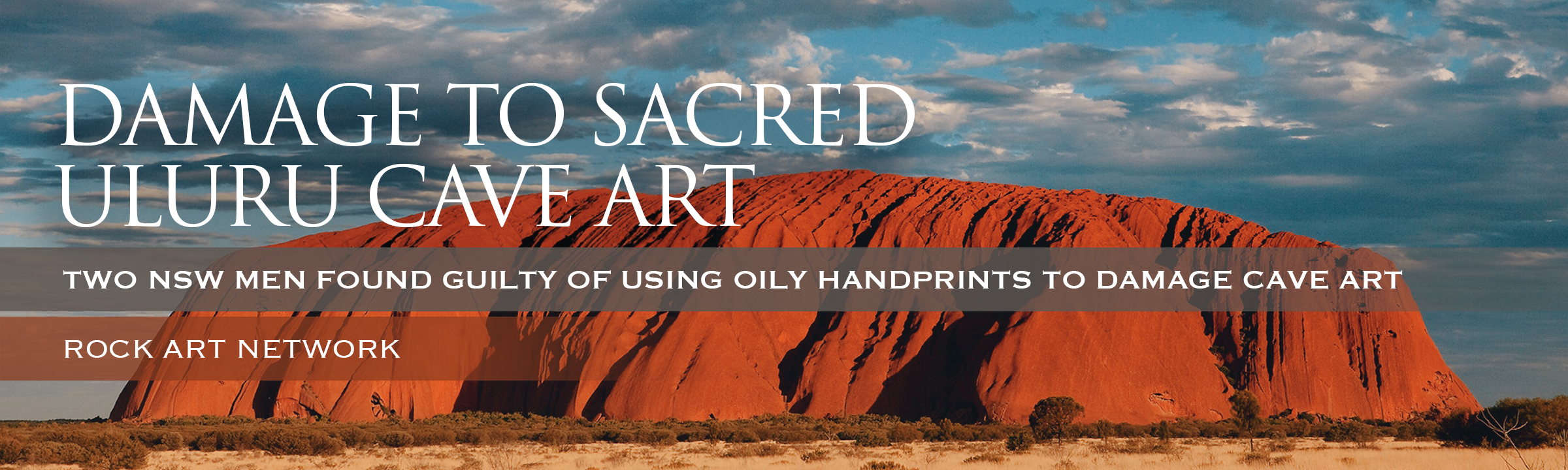 Two NSW men found guilty of using oily handprints to damage sacred Uluru cave art Australia