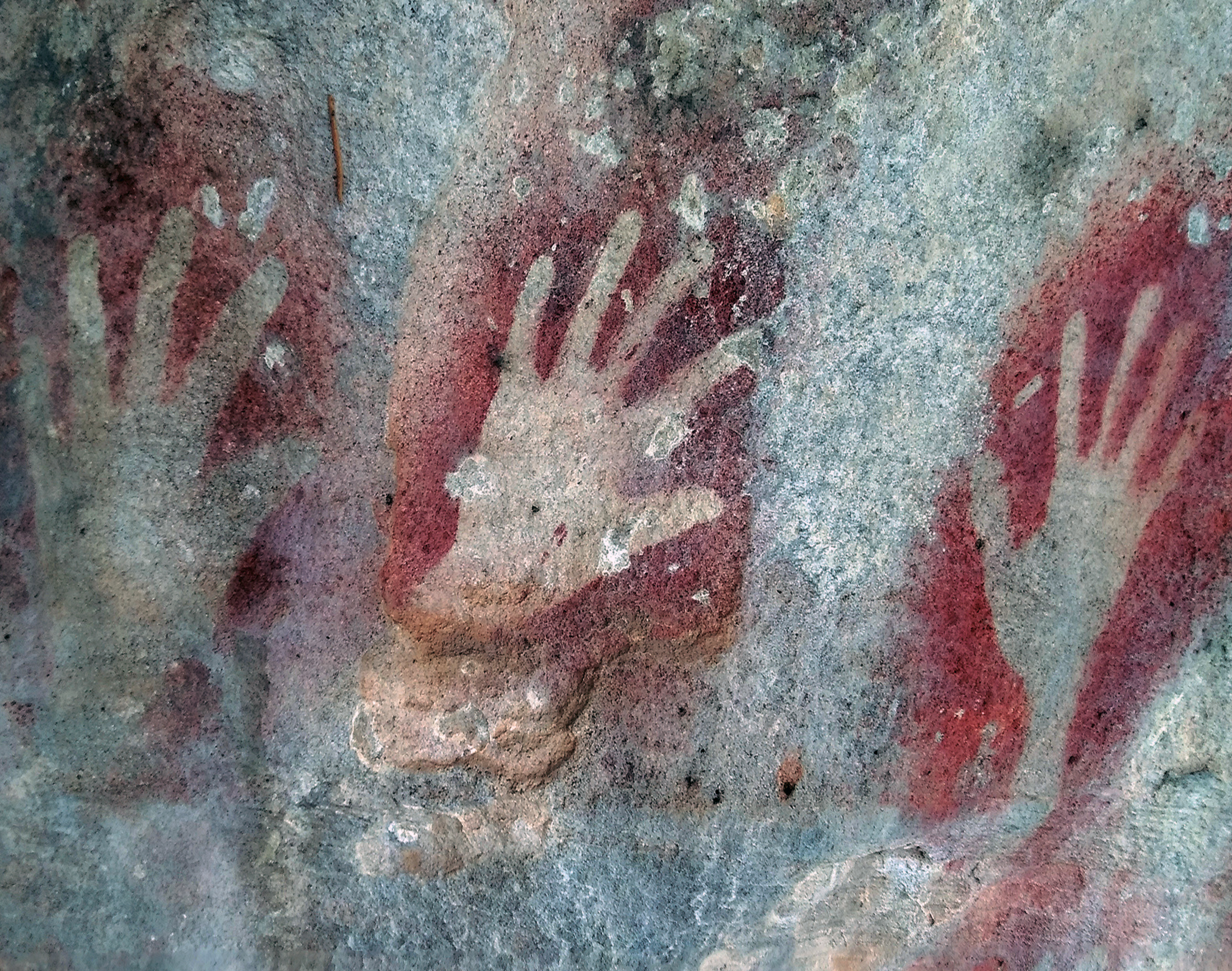 Three hand stencils