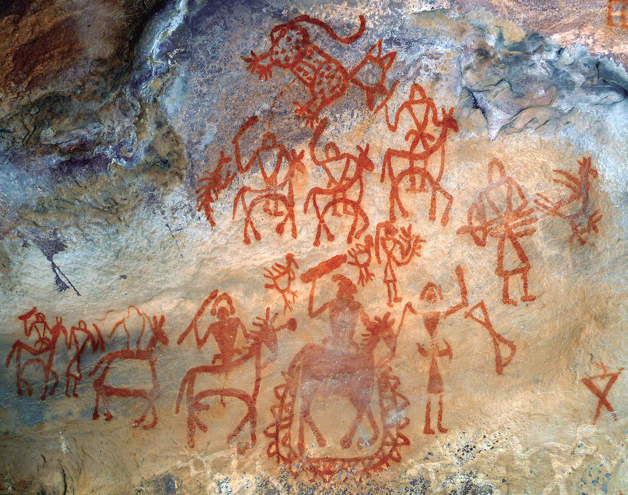 Scene of the horse riders made with wet red ochre from iron oxide, haematite and brush, prepared with tender bamboo. It is still popular among the local tribes