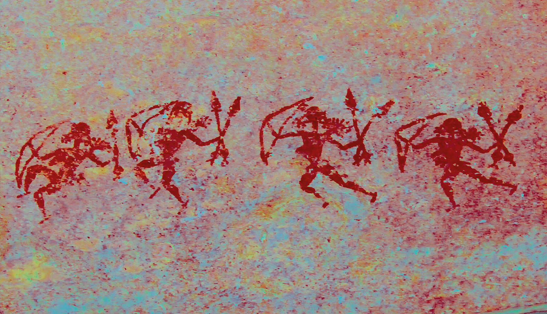 Women Hunters in Indian Rock Art Four women are holding bows and arrows and running in the same direction, probably to fight against another group. DStretch Ire.