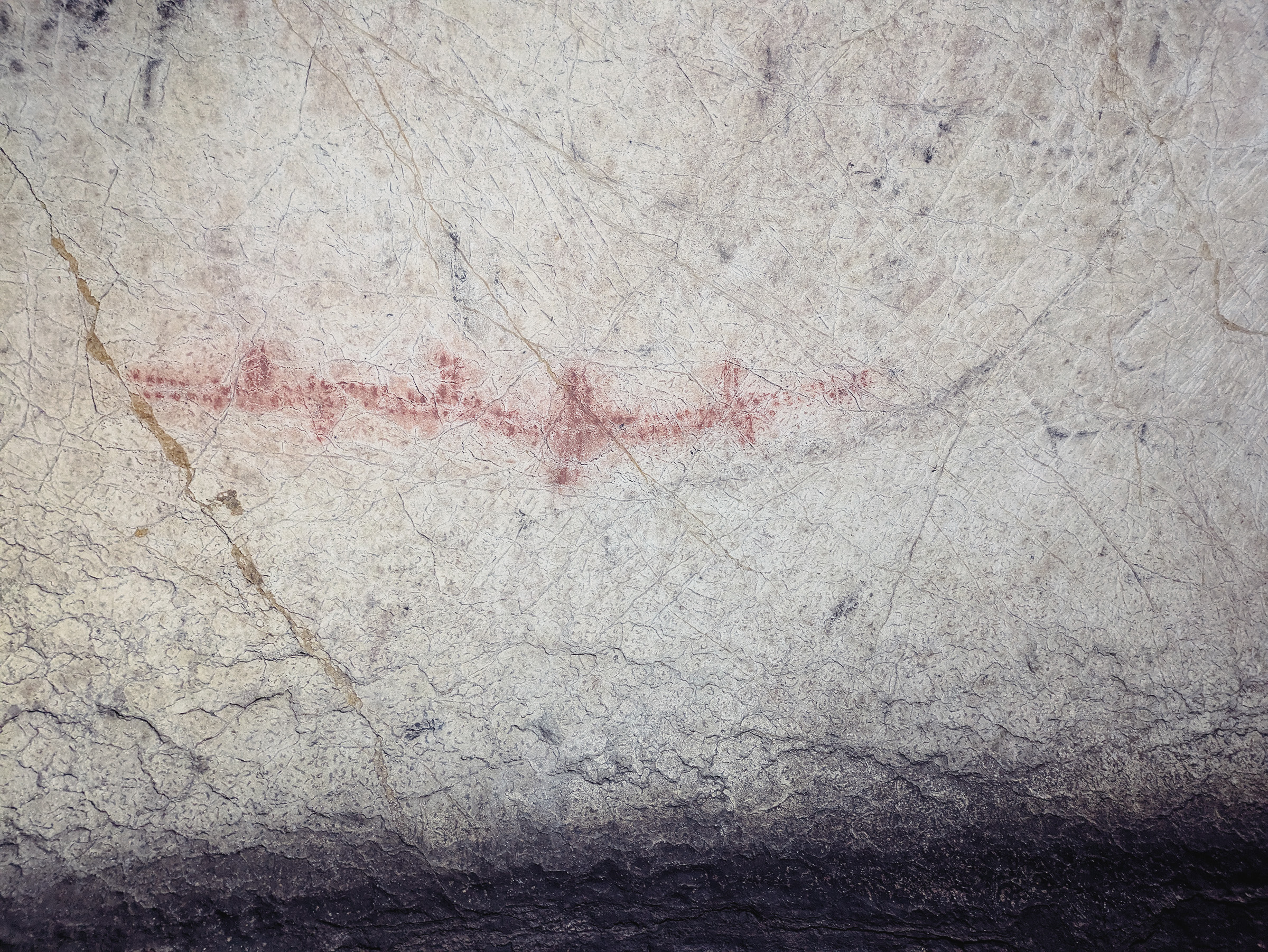 Ancient Rock Art Exploring Andalucia Painted Caves Spain Possible landscape depicted, delineated by the space made by animal hoof prints, indicating migratory tracks (no scale used)